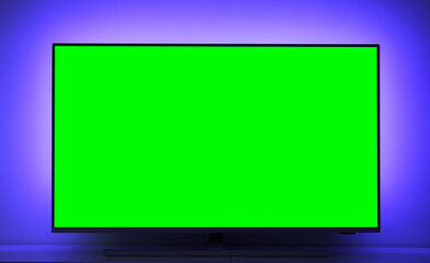 Close up of big green screen led TV in a cozy living room.