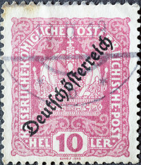 Austria - circa 1918: a postage stamp from Austria, showing the crown of Austria with overprint...