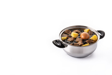 Traditional Jewish cholent isolated on white background. Hamin. Copy space