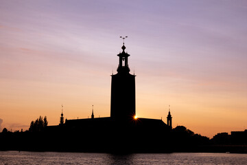 The silhouette of Stockholm city hall on a summer sunset in Sweden