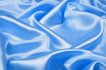 Obraz premium Smooth elegant blue silk or satin texture can use as abstract background. fabric texture background