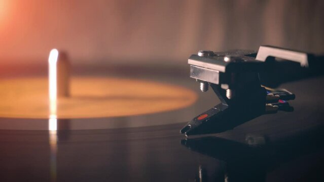 vinyl pickup on a record close-up. macro shot. sunny
