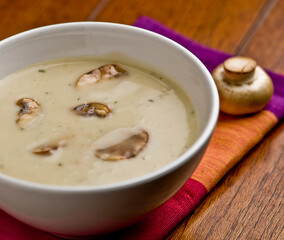 Delicious and creamy bowl of hot mushroom soup.