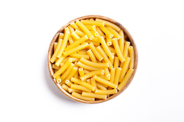  Uncooked pasta in wooden bowl on white background.