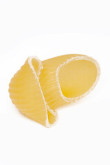  Tasty uncooked pasta on white background.