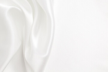 Fototapeta premium Abstract background luxury cloth. Elegance white satin silk with waves, abstract background luxury cloth, elegant wallpaper design. Abstract background luxury cloth or liquid wave