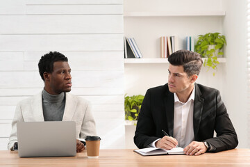 African American man suffering from racial discrimination at work
