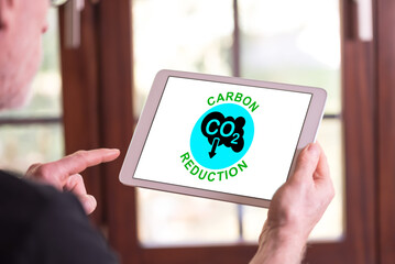 Carbon reduction concept on a tablet