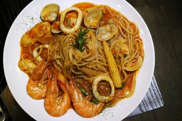 White plate with seafood pasta