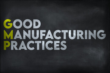 Good manufacturing practices (GMP) written on chalkboard