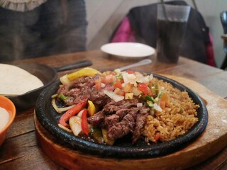 Freshly baked hot Teppanyaki pork dishes