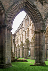 Rows of arches inside the ruins of Rievaulx Abbey in Yorkshire, for centuries the home of Cistercian monks until it was seized and destroyed by King Henry VIII in 1538.