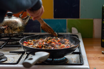 cooking meat in a pan, Hot vegetable stew