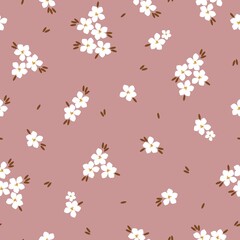 Seamless vintage pattern. Small white flowers and brown leaves. Dirty pink background. vector texture. fashionable print for textiles, wallpaper and packaging.