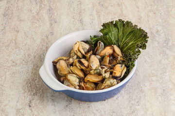Tasty marinated mussels in the bowl
