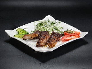 Grilled lamb chops served onion