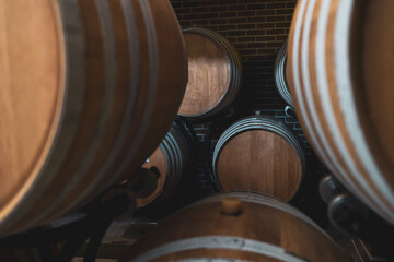 oak barrels for aging alcohol in the cellar