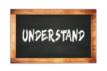 Obraz premium UNDERSTAND text written on wooden frame school blackboard.