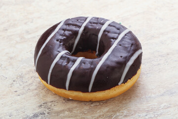 Glazed sweet tasty chocolate donut