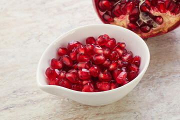 Ripe red Pomegranate seeds in the bowl