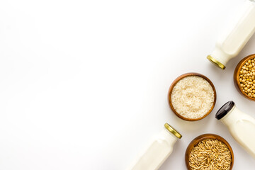 Dairy free vegan milk with nuts and cereals, top view