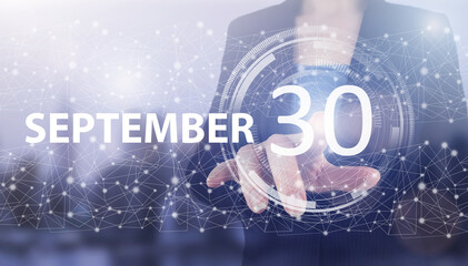 September 30th. Day 30 of month, Calendar date. Hand click luminous hologram calendar date on light...