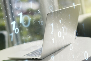 Creative abstract binary code sketch on modern laptop background, hacking and matrix concept....