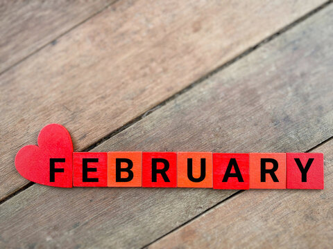 inspirational time concept - word february in vintage background. Stock photo.