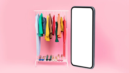 Huge Mobile Phone Screen Standing Near Clothing Rack, Pink Background