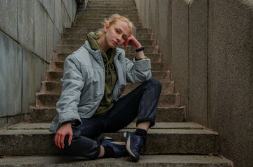 person sitting on stairs