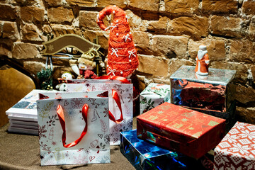 Composition of christmas toys on a brown brick wall background