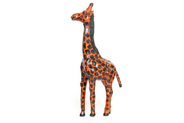 Toy souvenir figurine of a giraffe isolated on white background.
