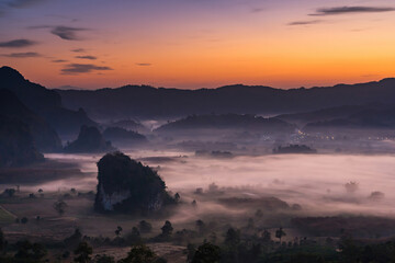 Sunrise and The Mist with Mountain Background , Landscape at Phu Langka, Payao Province, Thailand.