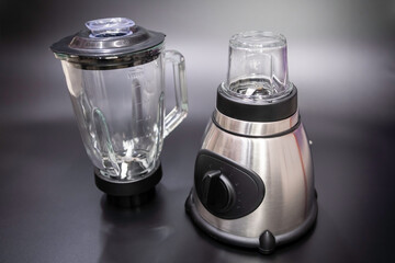 Silver modern electrical blender on a black background