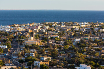 Obraz premium Aerial view of Dahab town and a mosque from the mountain nearby, South Sinai, Egypt