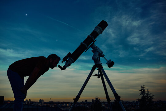 Man using sale telescope