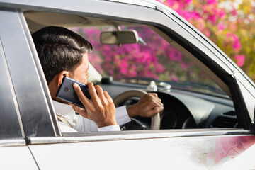 Cab driver from car asking customer adress on mobile phone call - concept of customer...