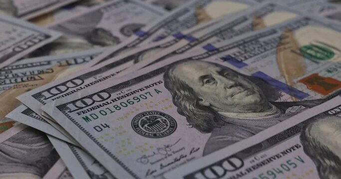 Hundred dollars bills american currency cash in the table