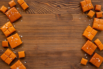 Caramel pieces of caramel candies with sea salt, top view