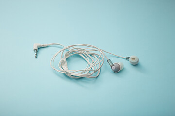 Fototapeta premium Headphones for gadget on background