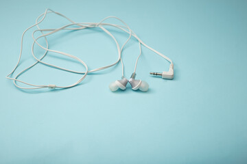 Headphones for gadget on background