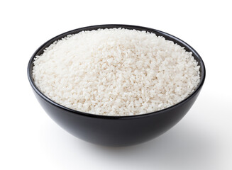 Uncooked round rice in black bowl isolated on white background with clipping path