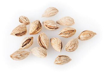 Heap of almonds isolated on white background