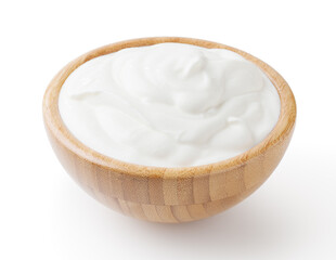 Sour cream in wooden bowl isolated on white background with clipping path