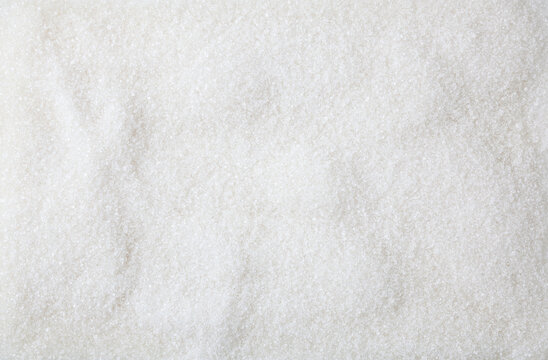 White granulated sugar background