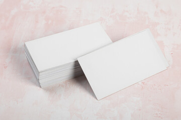 Business cards blank mockup on pink marble background mockup for design