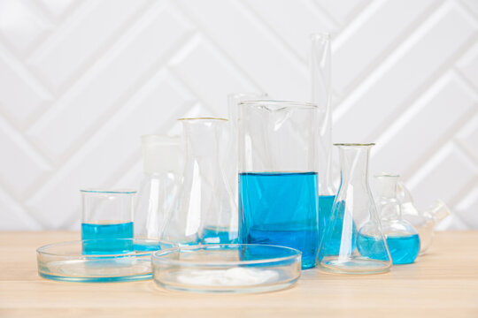 Laboratory glassware with test tubes. flasks, dropper, petri dishes, measuring cups and cylinders for scientific laboratories, laboratory equipment and analysis