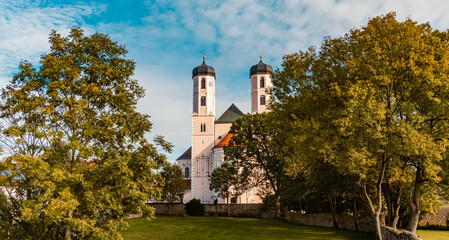 Fototapeta premium Beautiful autumn or indian summer view near the famous Oberalteich monastery, Bavaria, Germany