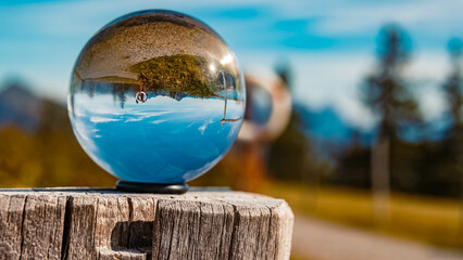 Crystal ball alpine landscape shot at the famous Fleckalm near Kitzbuehel, Tyrol, Austria
