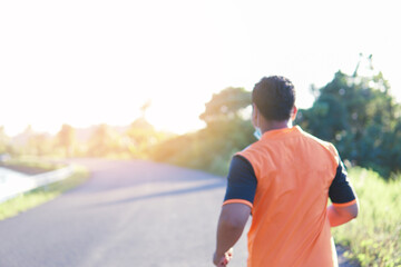 man running on the road, view of a person